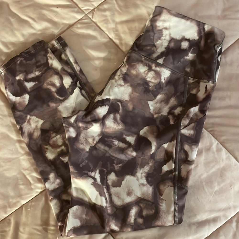 Activewear leggings. Multi color- burgundy tone and pink tones. Side pockets.